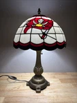 Vintage 2003 Nfl Tampa Bay Buccaneers Round Tiffany Style Stained Glass Lamp. Fixed Price $149.99.