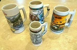 Lot Of 4 Collectible Beer Steins - 2 Budweiser Coors Avon. Fixed Price $49.00.