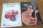 Hal Leonard Lead Rock Method Vol. 1 & Mel Bay's New Easy Way To Guitar Books. Fixed Price $11.95.