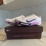 Faith Kipyegon Breaking 4 - Nike Air Zoom Victory Elite Spikes. Fixed Price $600.00.