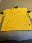 Nike Men's Storm-fit Oregon Ducks Light Weight Yellow 1/4 Zip Jacket Size Large. Fixed Price $59.00.