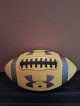 Under Armour Junior Football, Black & Yellow Logo Ftbl Ball.. Fixed Price $16.99.