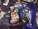Giant Lot Of Seattle Seahawks Nfl. Flags, Jersey, Hats, Football, Etc. Fixed Price $55.00.