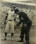 1975 Press Photo Flip Wilson Directs Umpire Nick Colosi Chores Home Plate. Fixed Price $24.99.