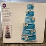 Wilton Towering Cake Stand 6 Tiers, Assembleable/separable. Fixed Price $99.00.