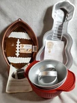 1990 Wilton Football Cake PAN/2000 Guitar Pan/round Pans Of Different Sizes. Fixed Price $12.00.
