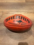 Sherrin Kangaroo Australian Genuine Leather Red Football Official Size Used. Fixed Price $55.00.